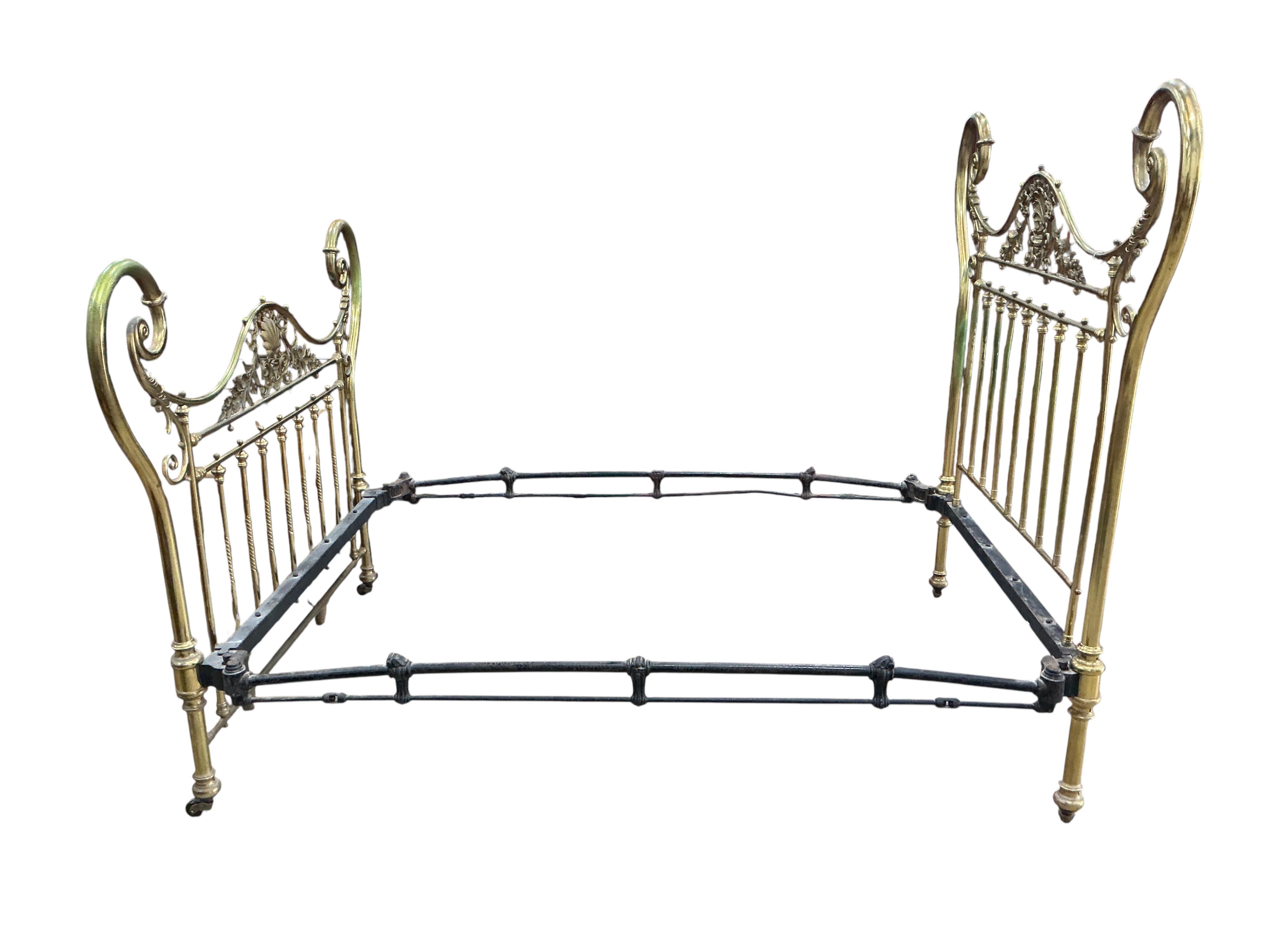 A late Victorian brass double bedframe, width 150cm, length 208cm, height 165cm